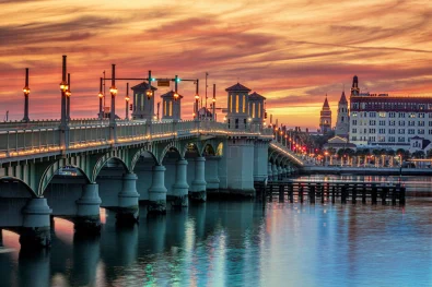 Truthful Transport regional auto shipping services crossing the historic Bridge of Lions in St. Augustine, Florida, connecting local coastal car shipping routes.